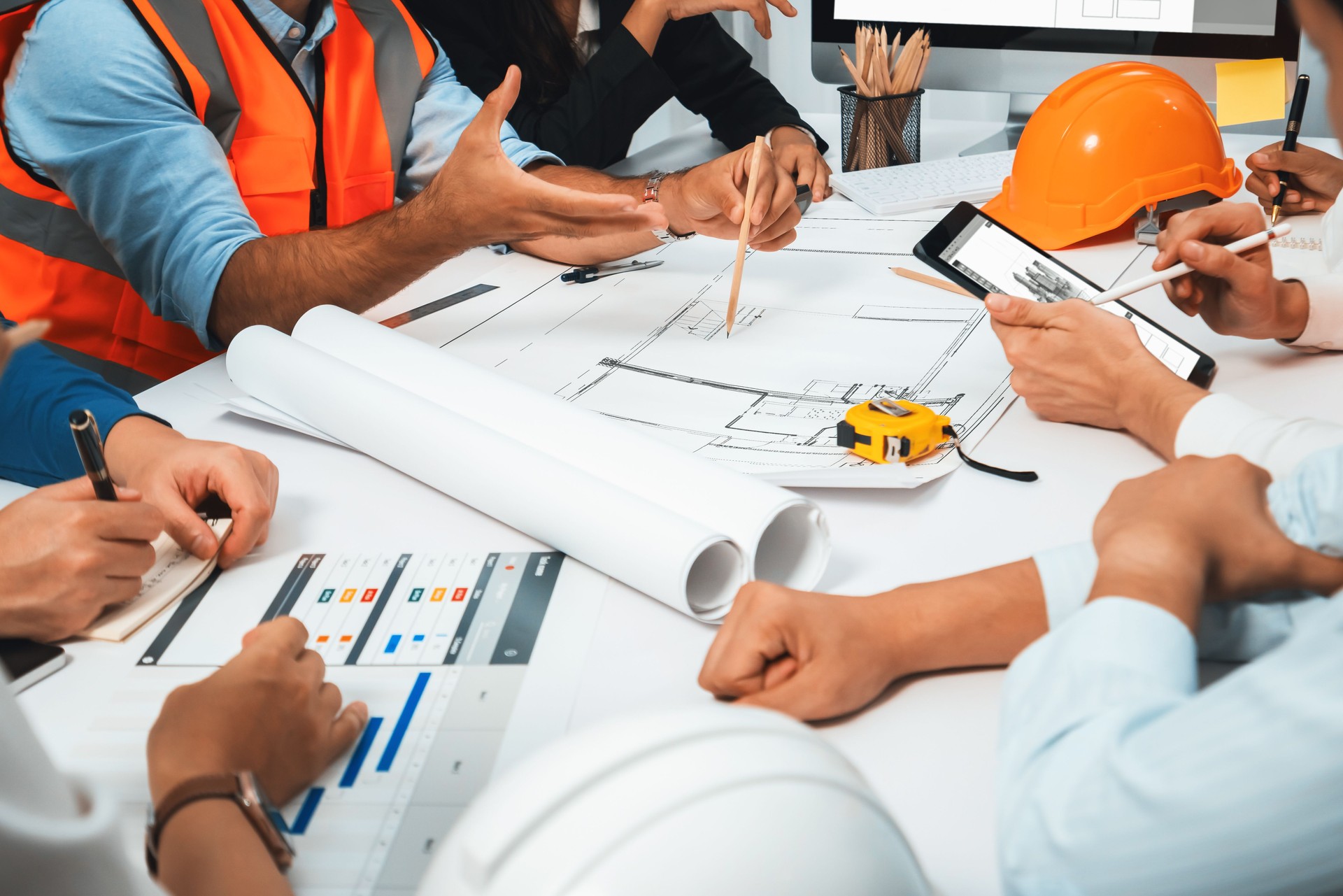 Diverse group of civil engineer and client working on architect. Prudent